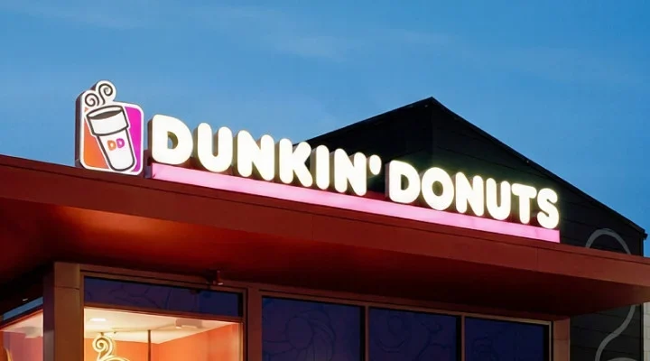 3d led channel letters backlit storefront signs and halo lit business logos dunkin donuts illuminated channel letter sign on a building roof at twilight 0